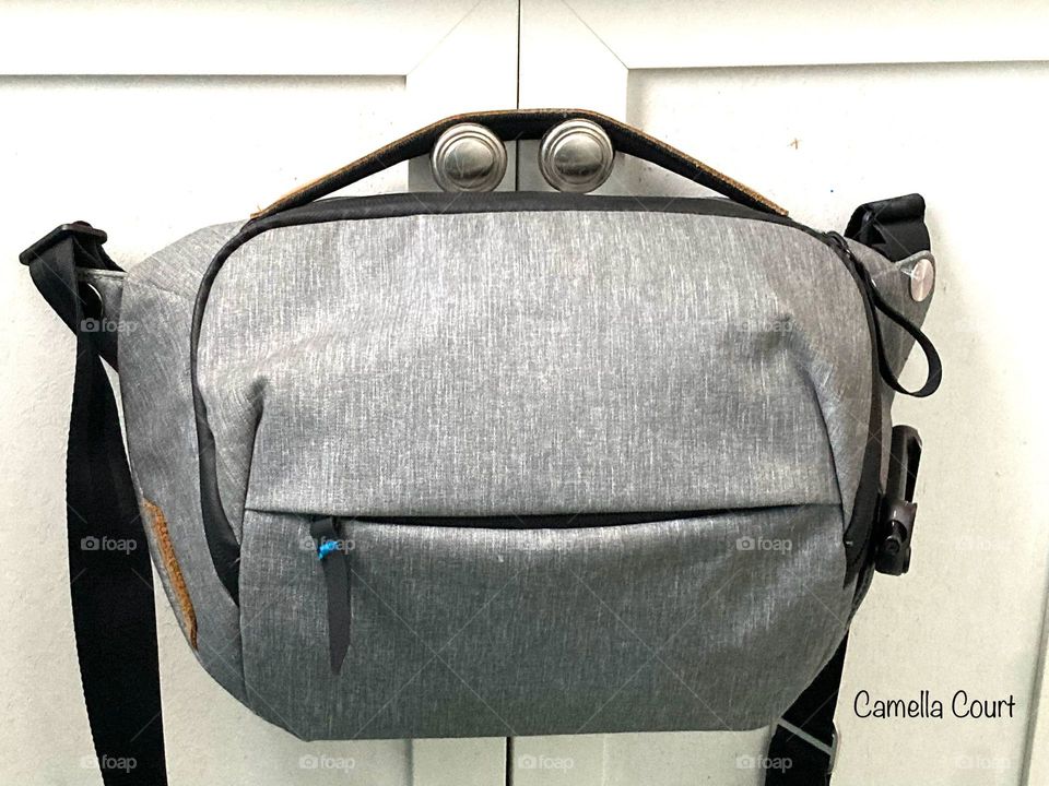 The silly face in the camera bag