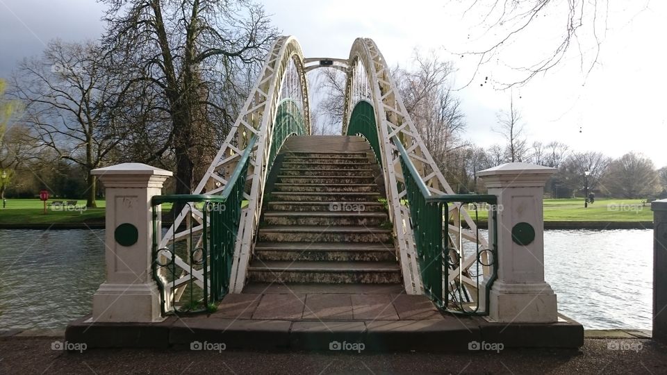 Victorian steel arch footbridge over the River Great Ouse in Bedford. Explored in Spring.