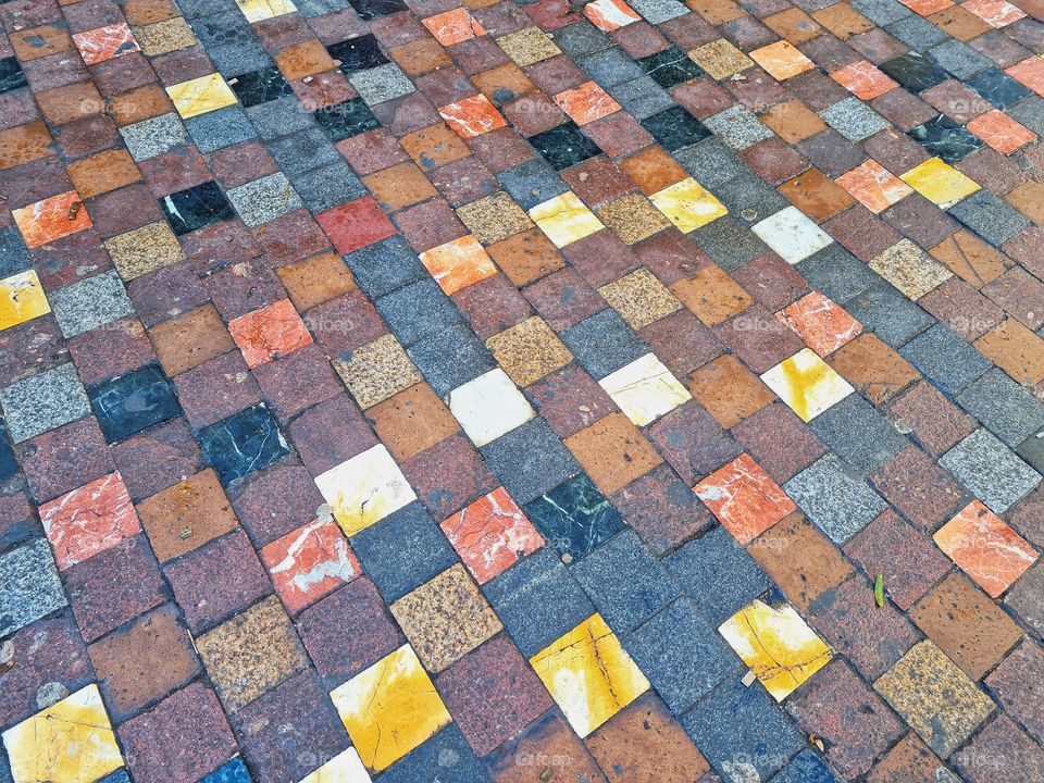 floor with multicolor tiles of rectangular shape