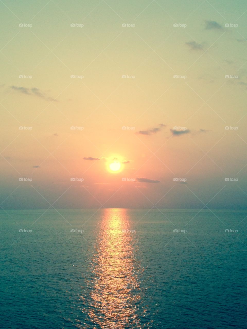 Sunset. Photo was taken far out at sea in February 2015.
