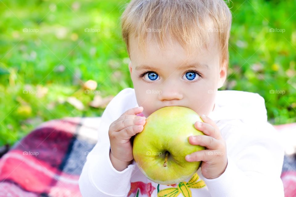 Cute baby with Apple 