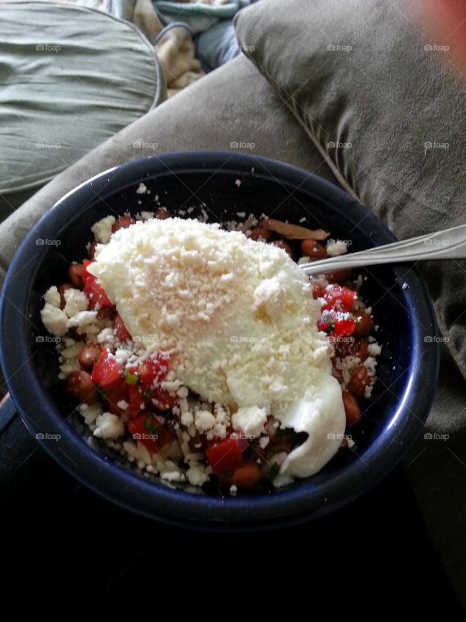 goat cheese beans and rice with an egg for breakfast