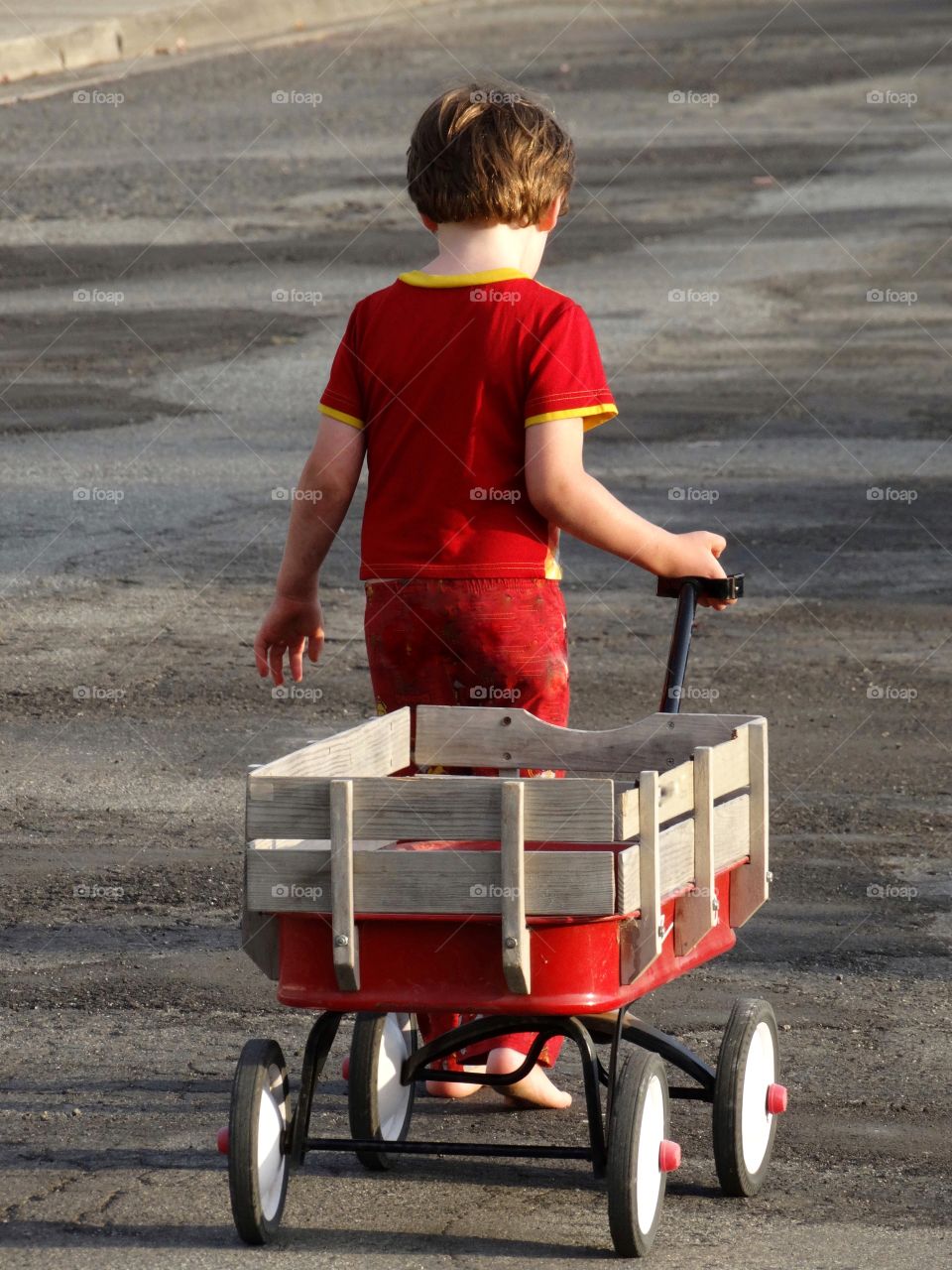 Boy With Red Wagon