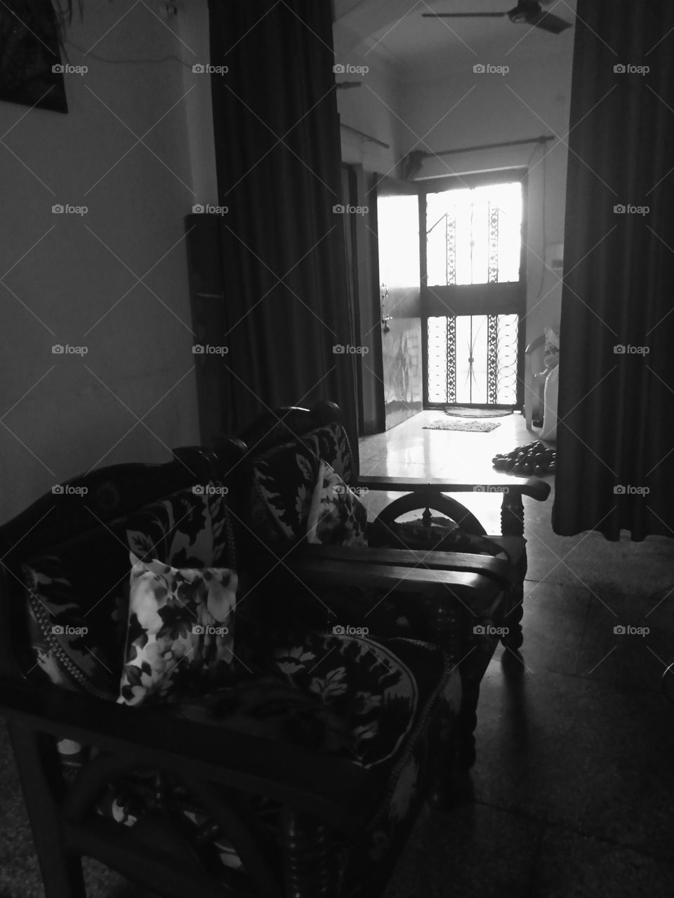 view of a portion of our drawing room while it's raining outside