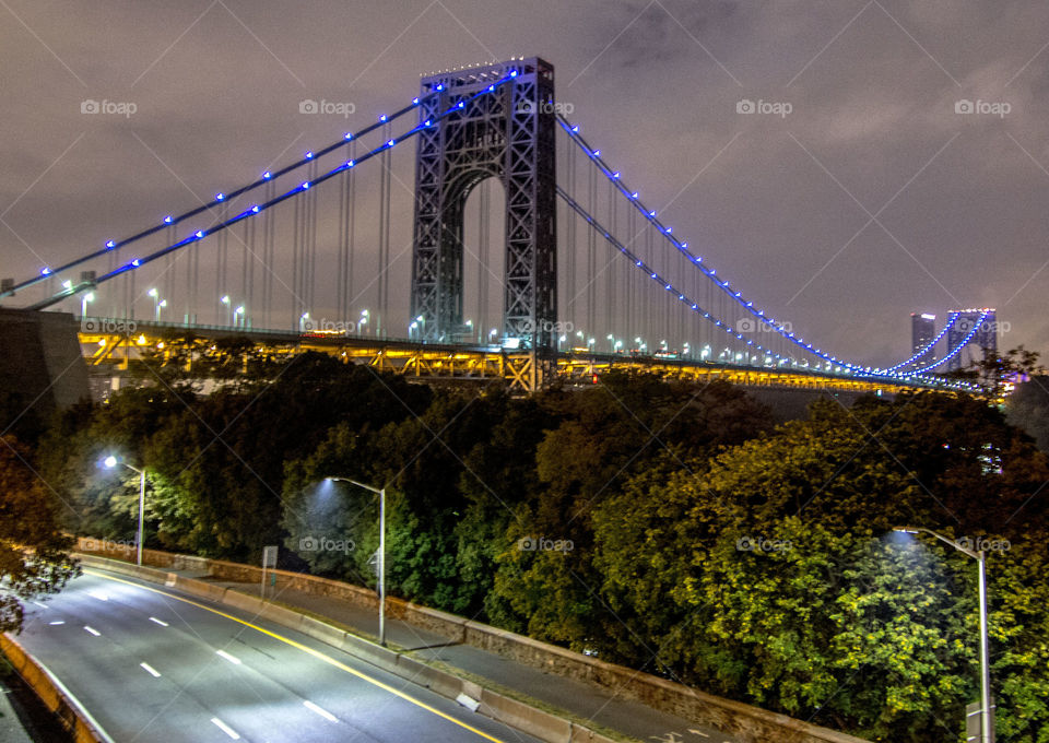 George Washington Bridge. One of the busiest bridges of NYC. Very beautiful to stare at as long as you're not stuck in its traffic.