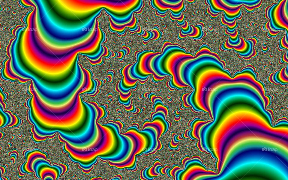 OPTICAL ALLUSION . A rainbow swirls