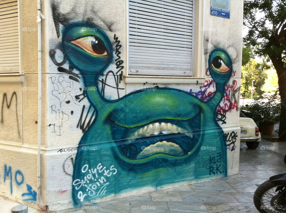 street green graffiti face by jeanello