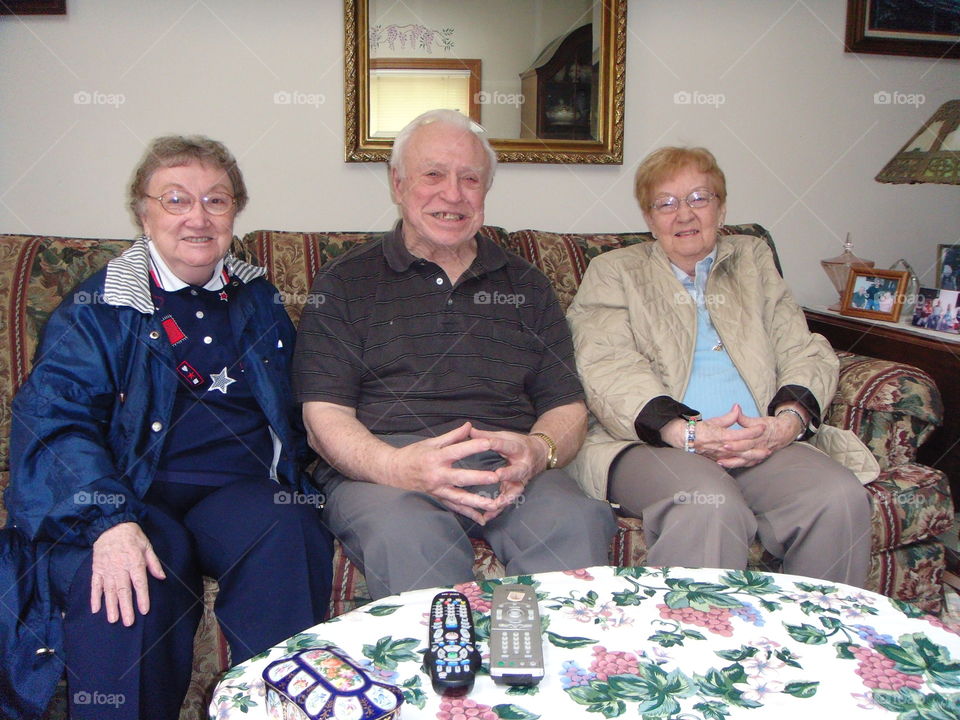 Old friends visiting & laughing.