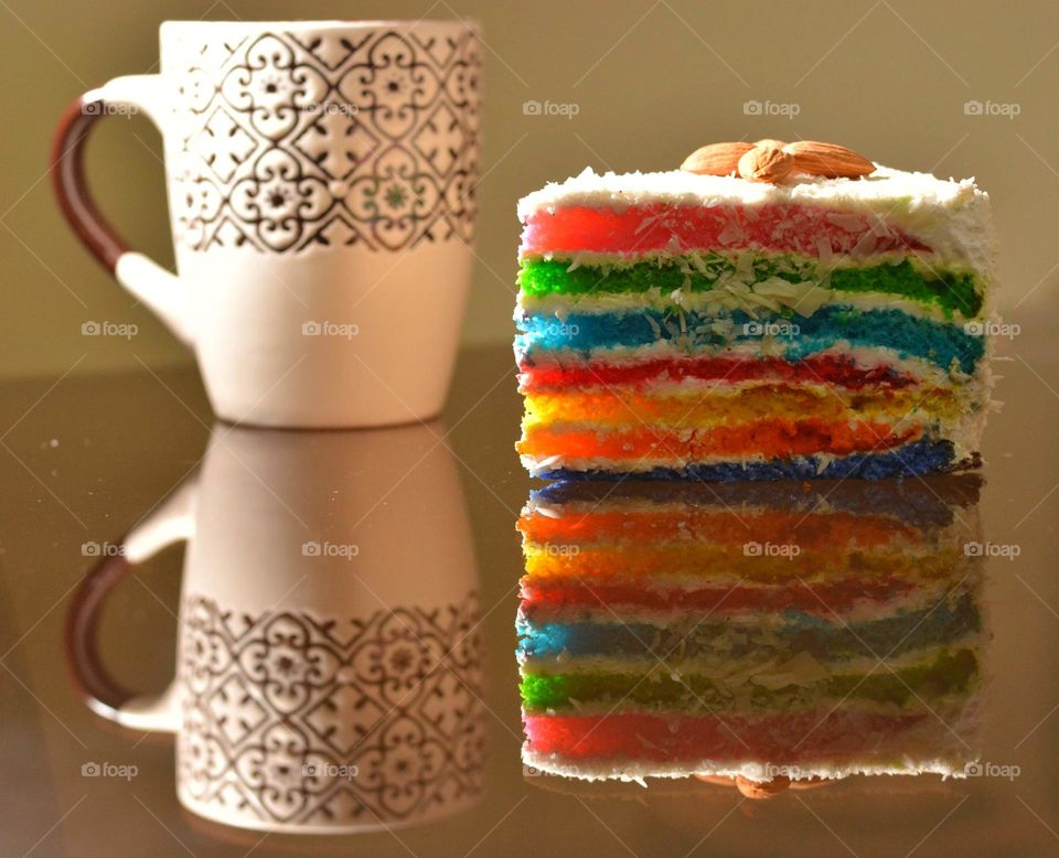 Rainbow cake with tea