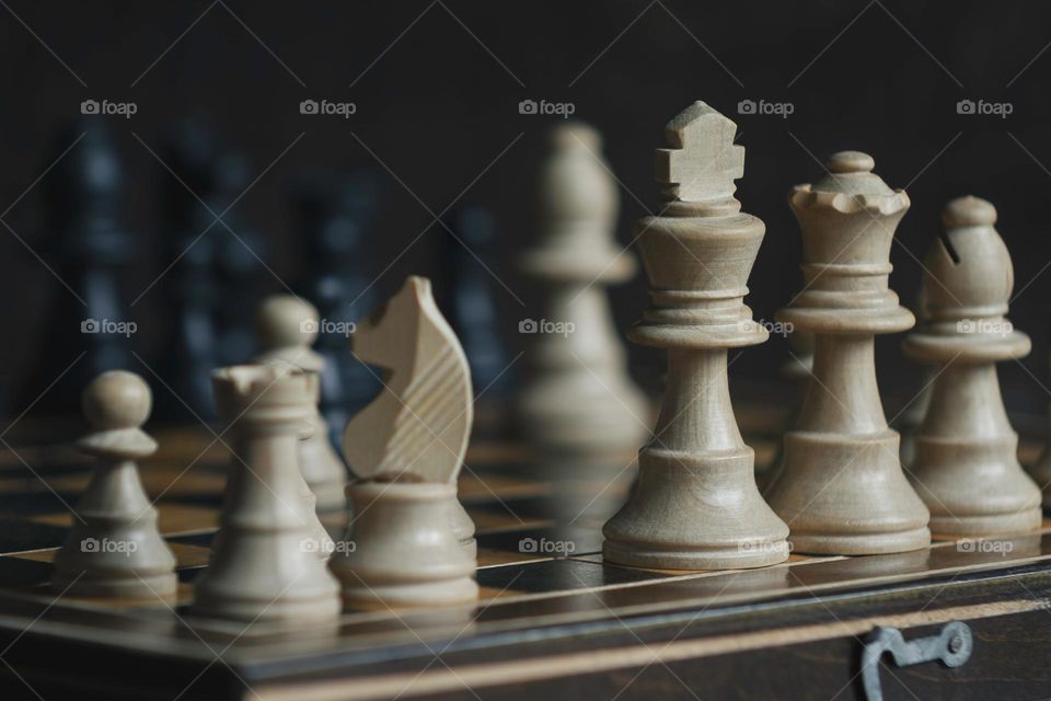 Old wooden chess board & pieces