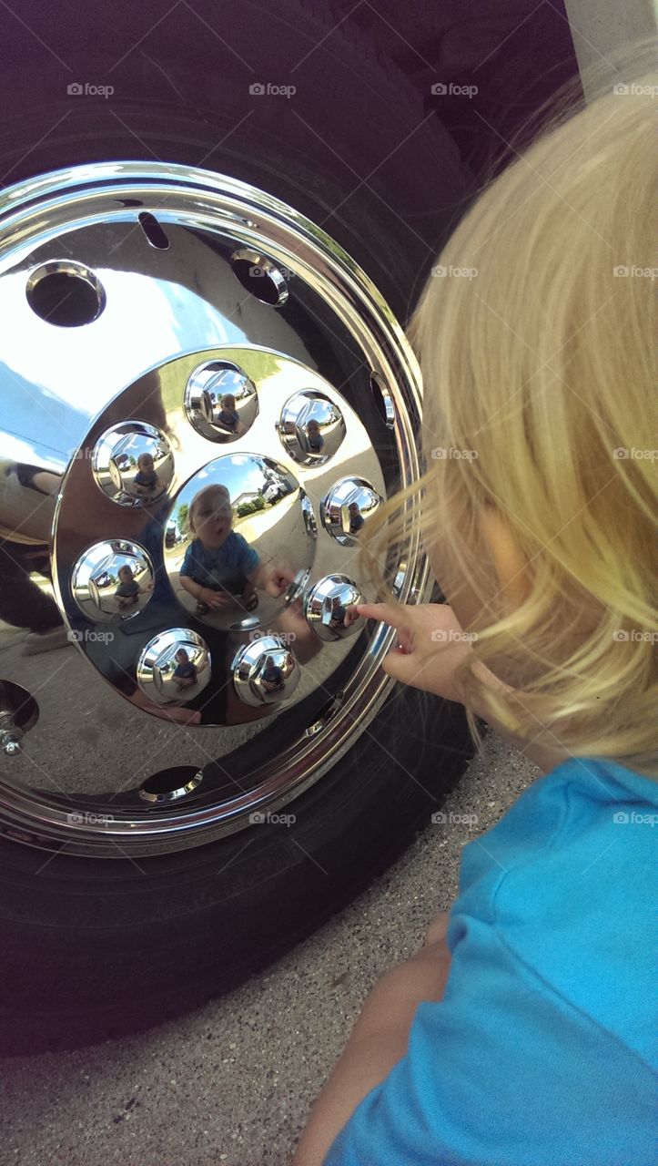 Loves his reflection in the hubcap
toddler thinks it is awesome!
