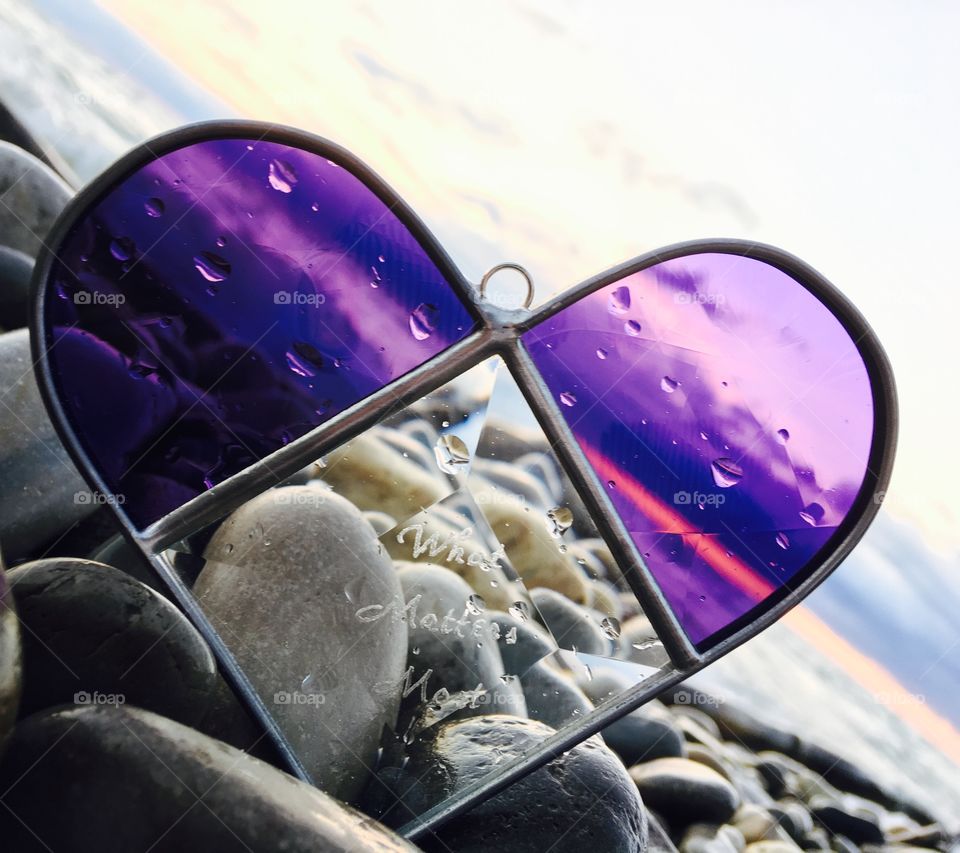 Purple Heart shaped glass decoration with Lake Michigan in the background 