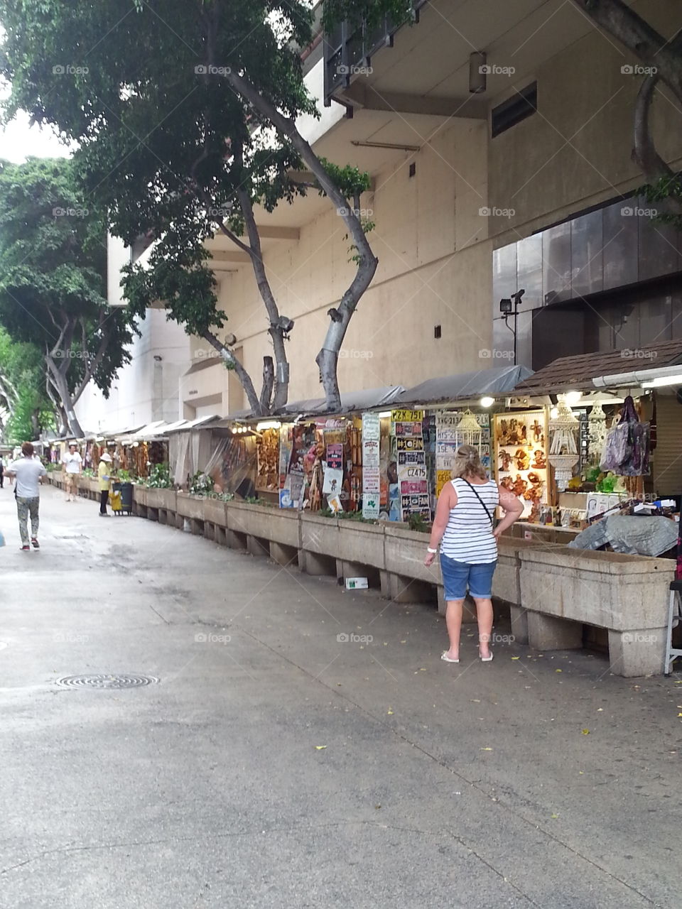 Street market. Street market, where items and people of different cultures gather with the same interests. Waikiki HI