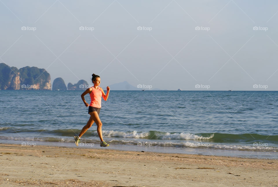 girl running on a beach