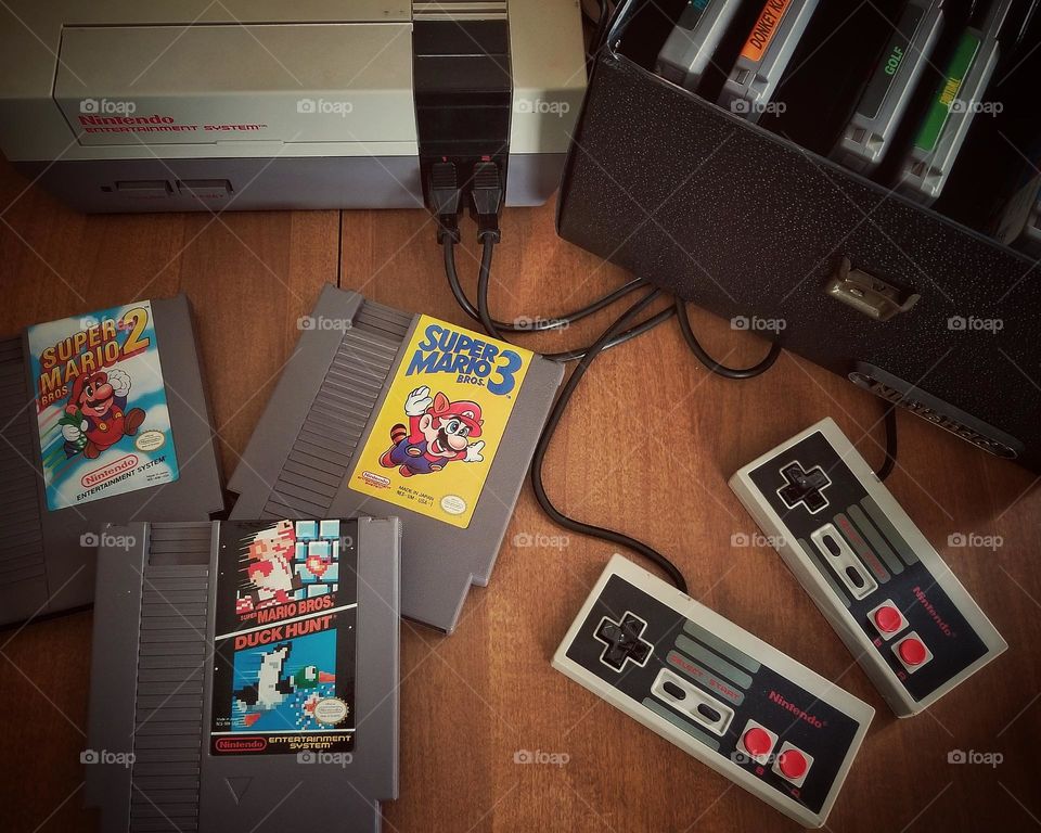 Vintage Nintendo Mario Cassettes & Console with controllers