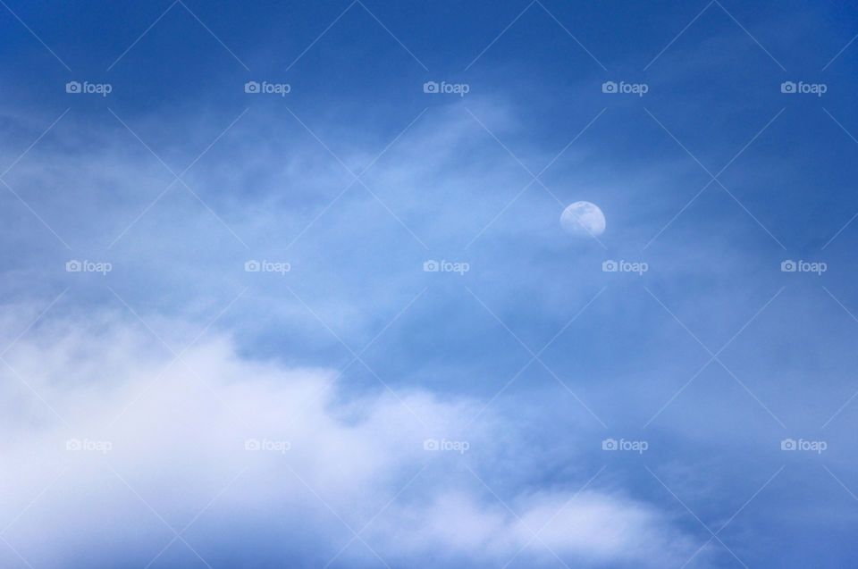 Monochrome - moon and clouds in the afternoon