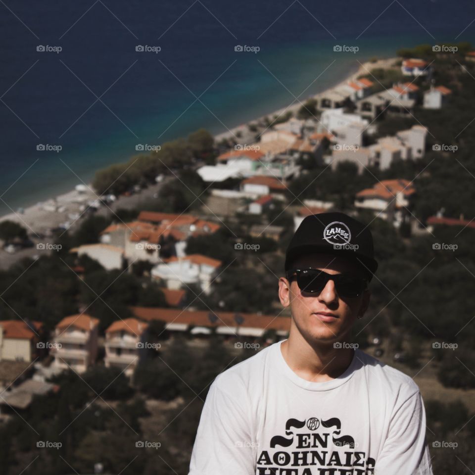 guy standing at the edge of a cliff