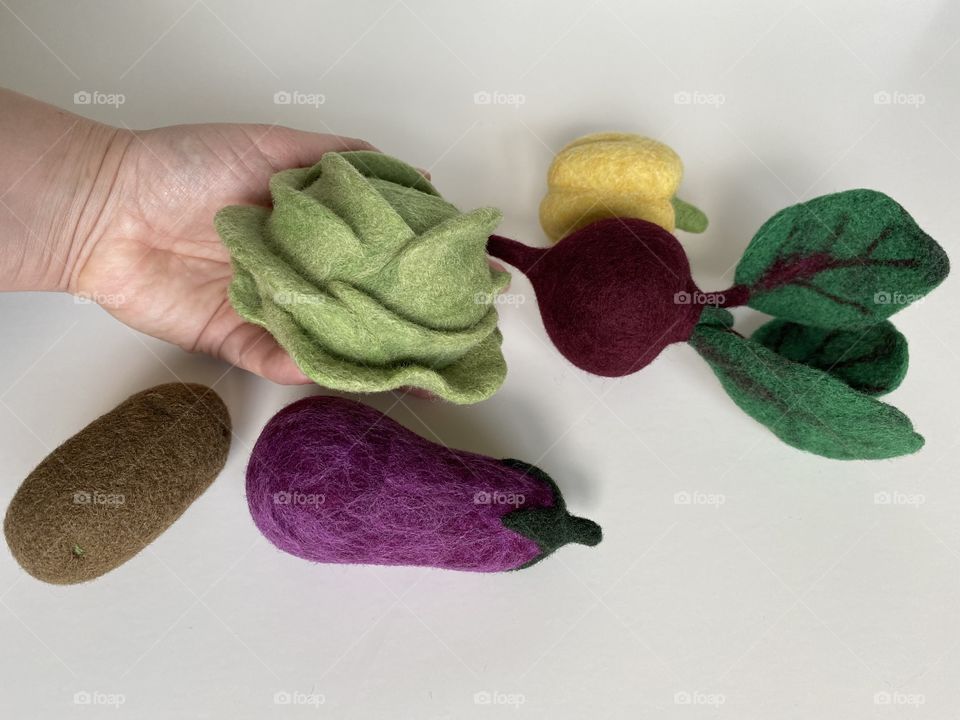 Fake vegetables on a white background 