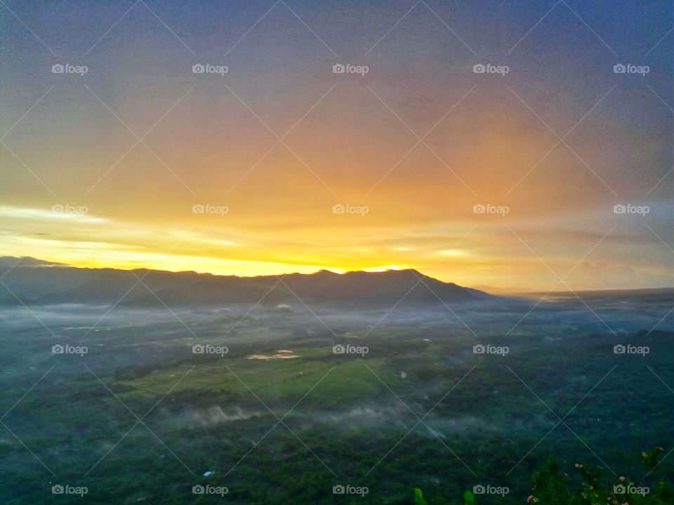 beautiful sunset in Mount Cumbri, Purwantoro, Indonesia