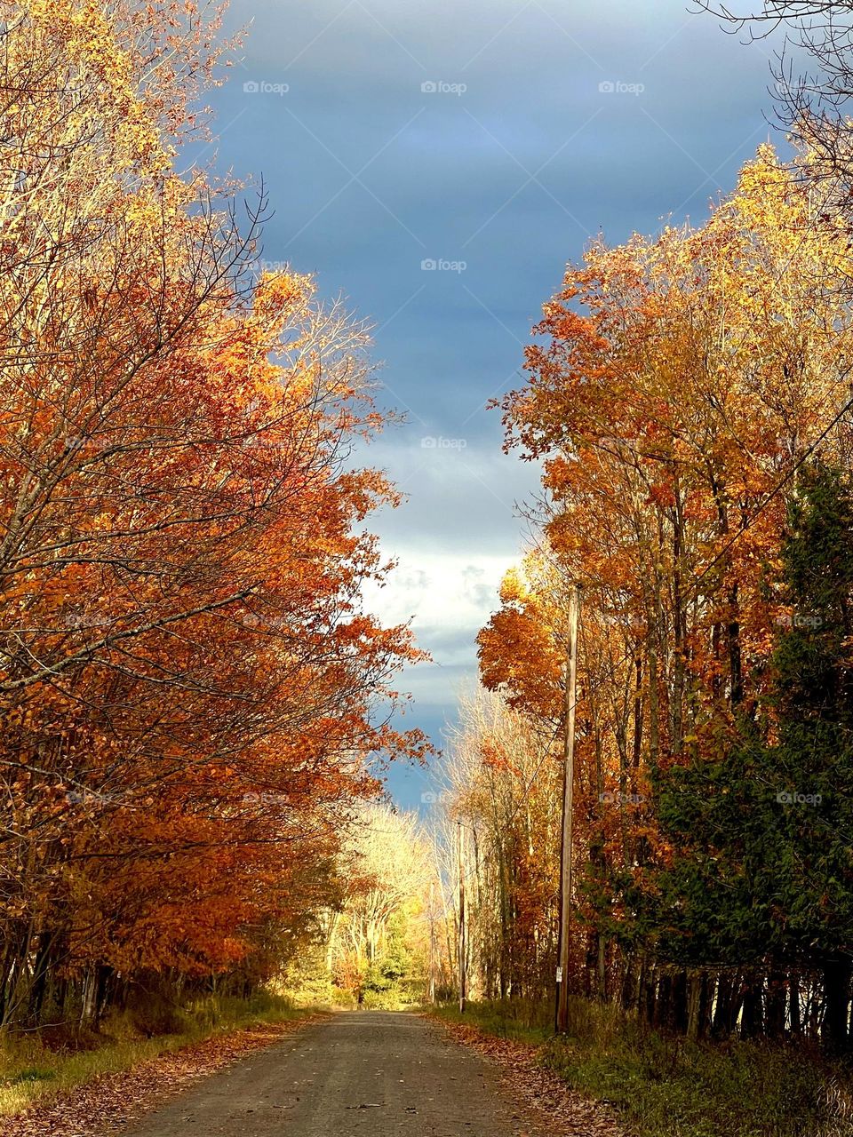 Storm clouds battle the sunset on an October evening.