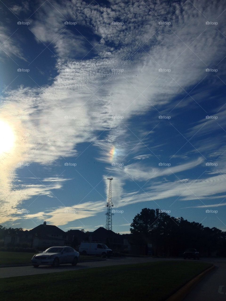 Beautiful contrails with a rainbow