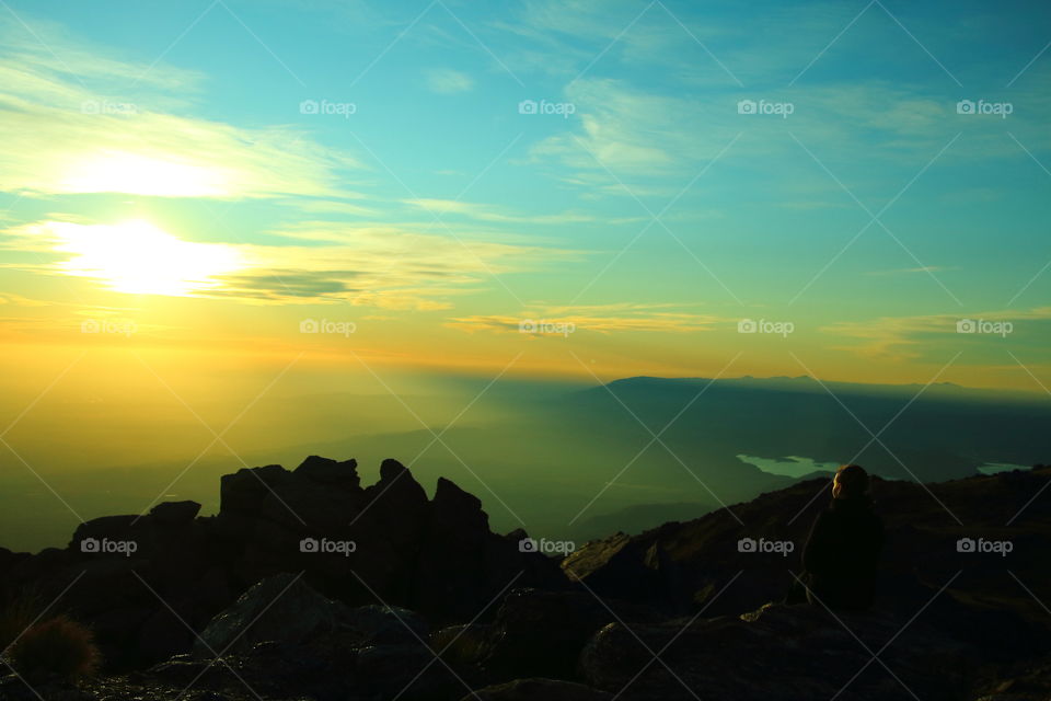 sunset in the mountains. valley from mountain edge at sunset