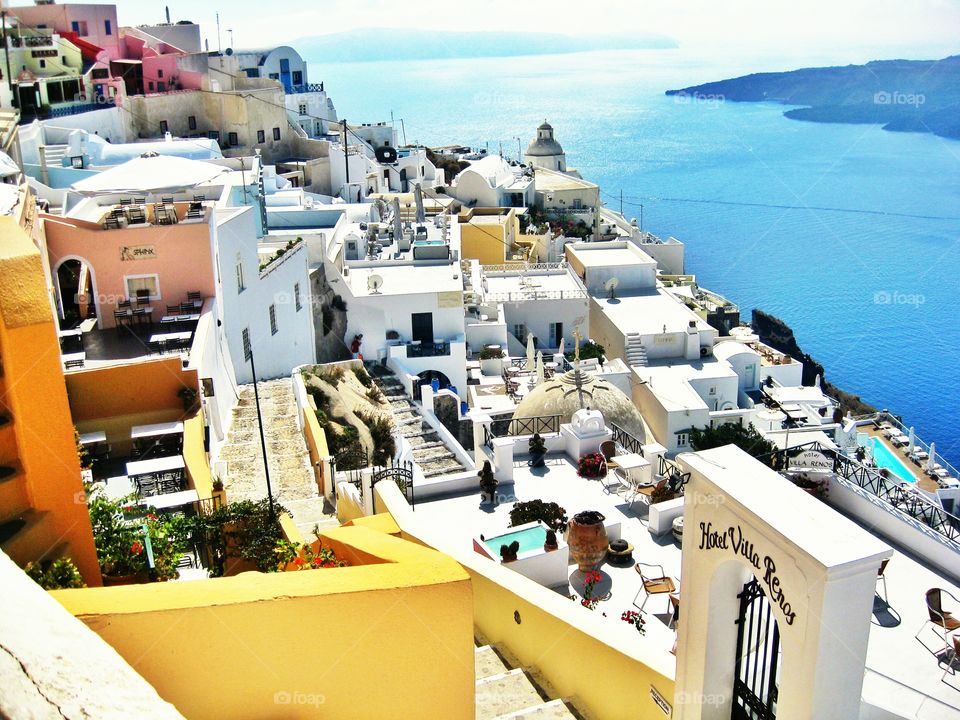 The photo is taken from the Oia section of the Santorini island, Greece.