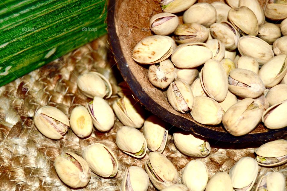 Pistachios in coconut shell