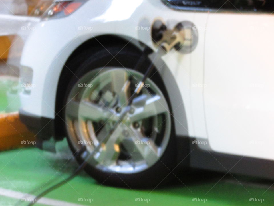 a blurred view of electric car charging