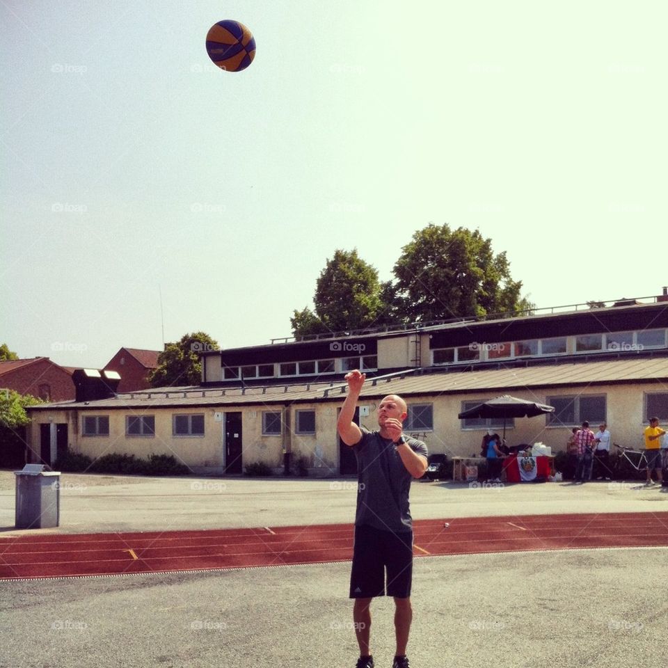 Playing basketball