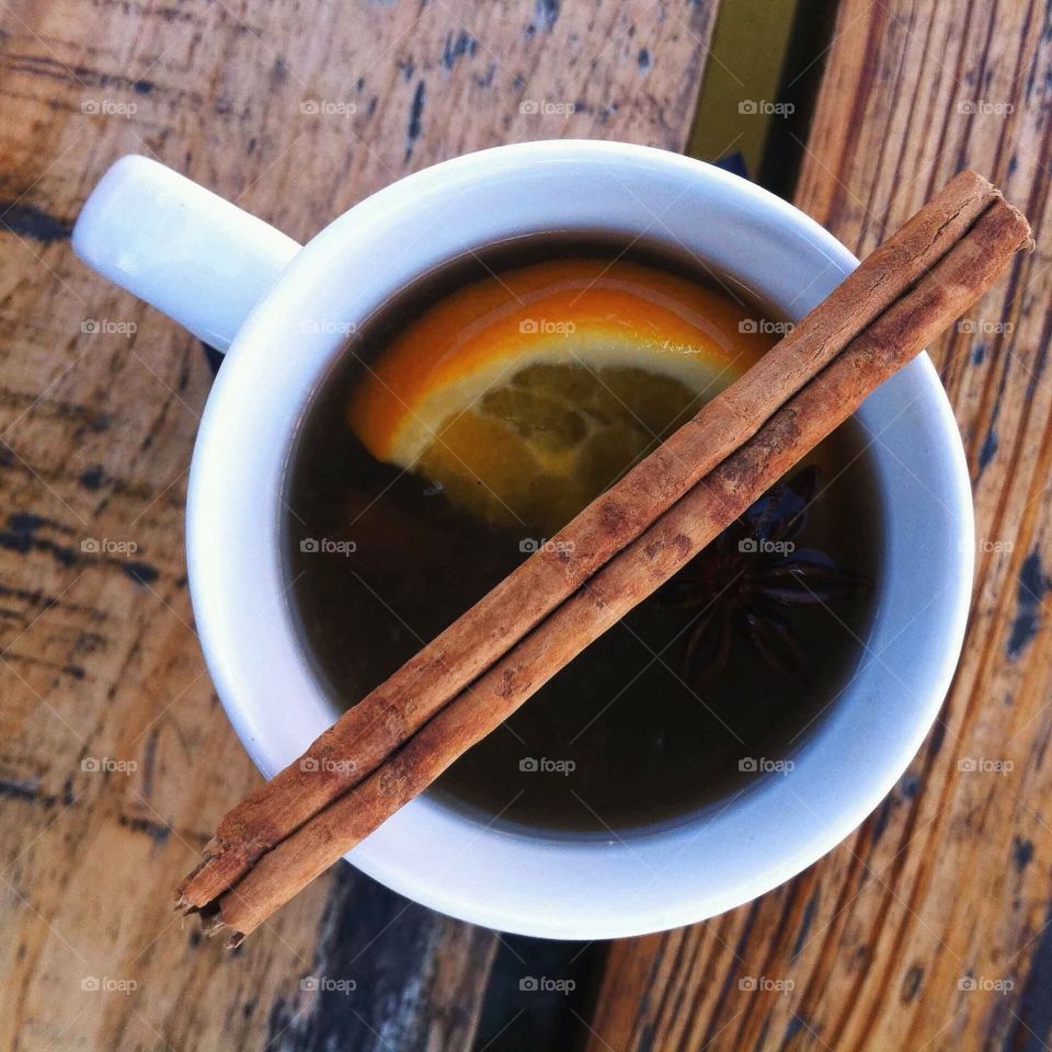 Cinnamon over the tea cup