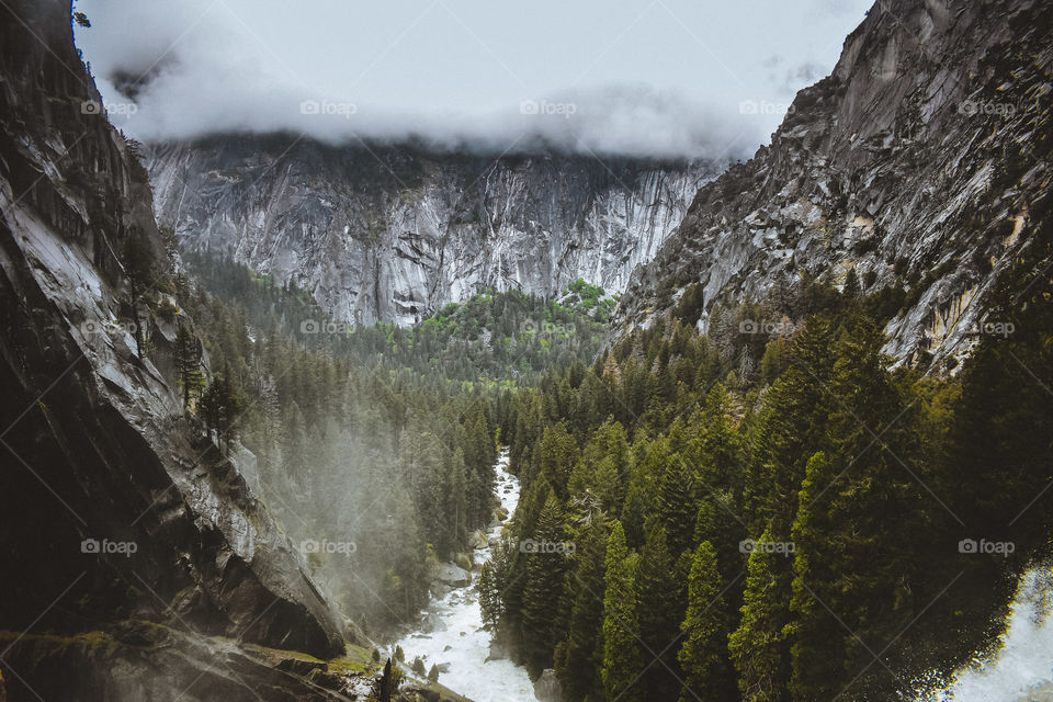 A cheeky morning fog creeps in over the Mist Trail in Yosemite National Park. 