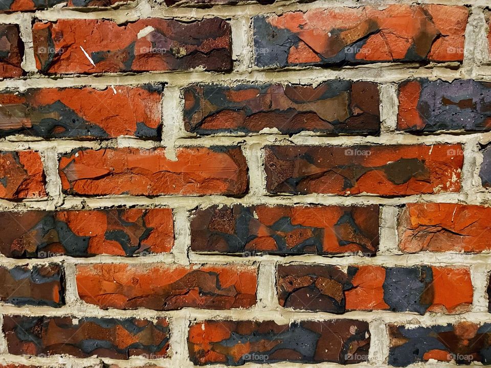 A standard brick pattern with rich reds, blues, and purples. Good for a background, or behind text. 
