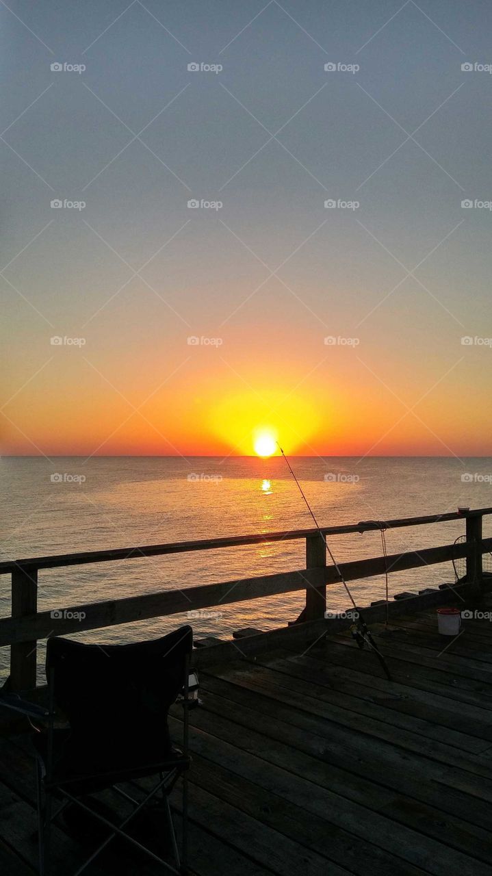 sunrise fishing on the pier