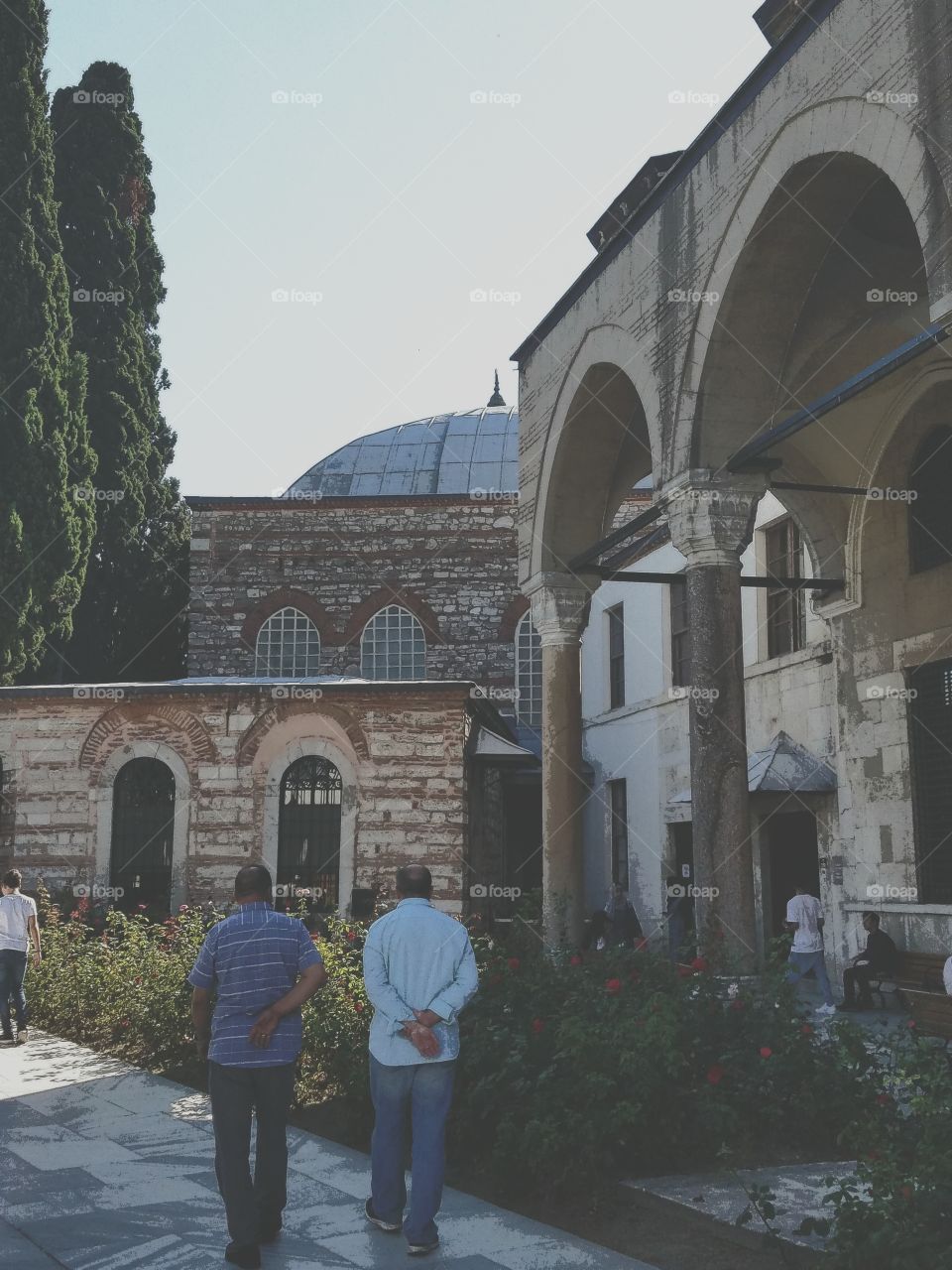 two men walking outside of the sultan's palace In Istanbul Turkey