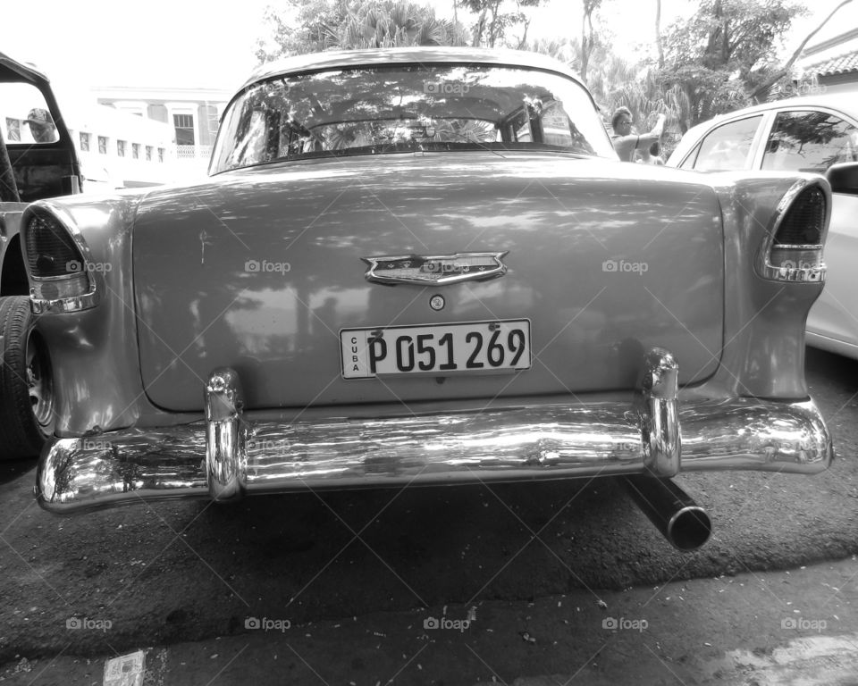 Cuba: Antique Chevy! As I see Santiago de Cuba in black and white, and sometimes in color! Cuba is a special destination and people know how to enjoy themselves, despite obvious signs of poverty and hardships. The streets are filled with vibrant colors and rhythm and it is not uncommon to see people dancing in the streets and alleys to the sound of loud salsa music! Wish I could, but It's impossible to capture it all!