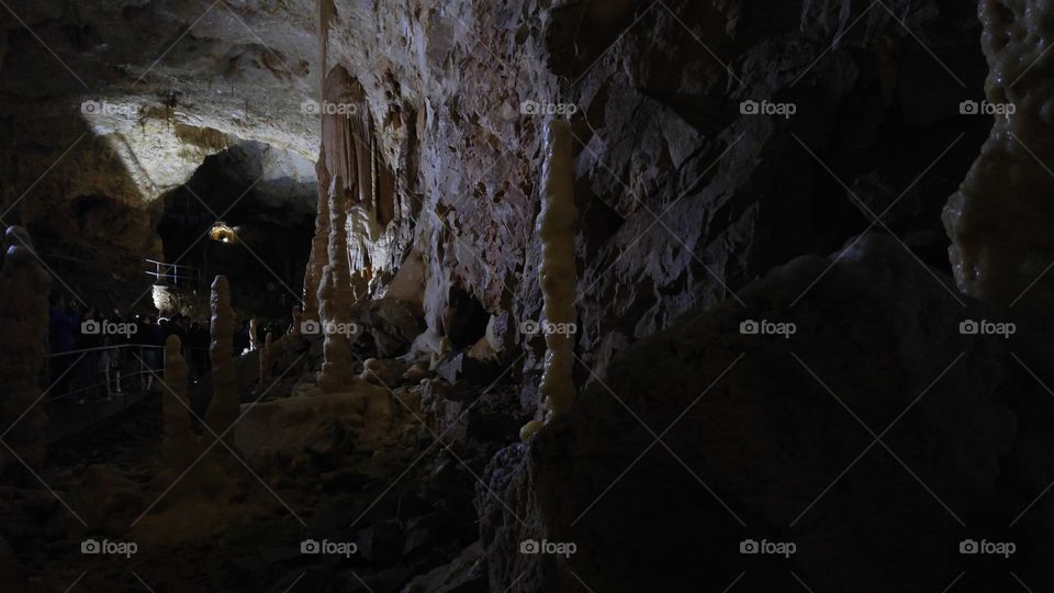 A dark underground cave in Romanian mountains