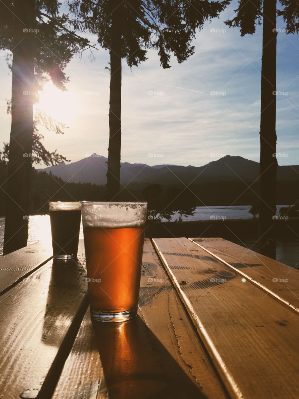 Two drink glass on wooden table