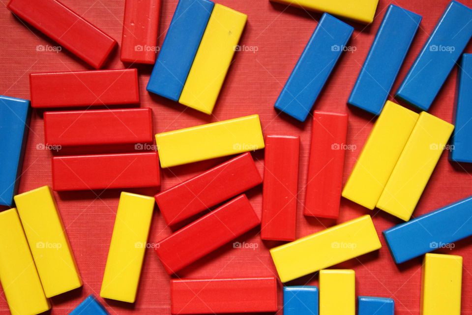 Close up of rectangular colorful wooden building blocks 