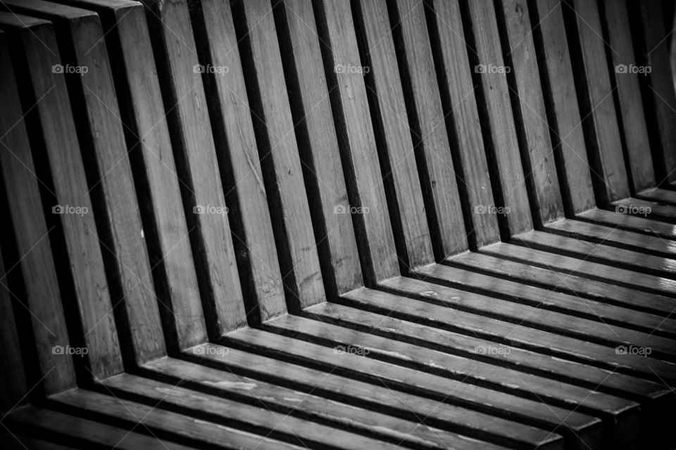 abstract shot in black and white of a bench pattern