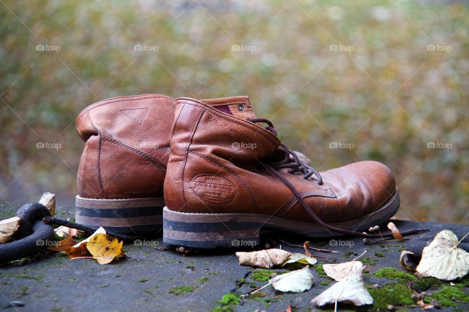Boots and autumn background