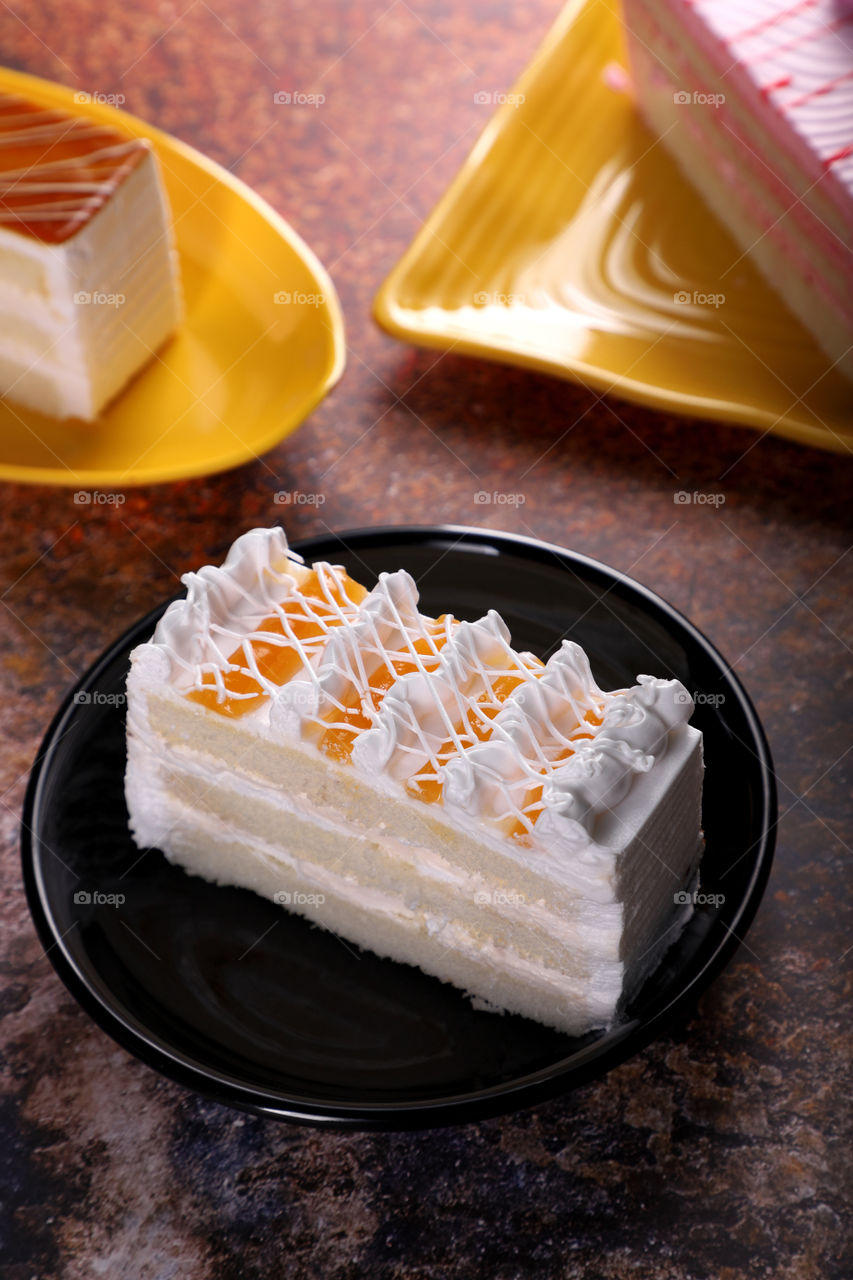 Pineapple pastry cake on old rustic background