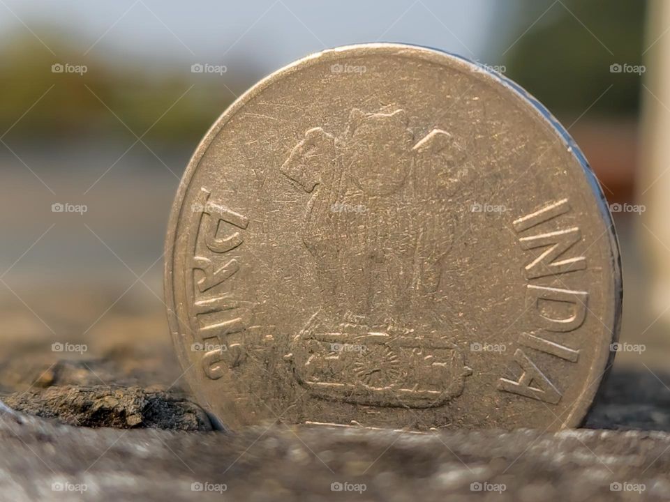 Indian coin printed with india in English and hindi