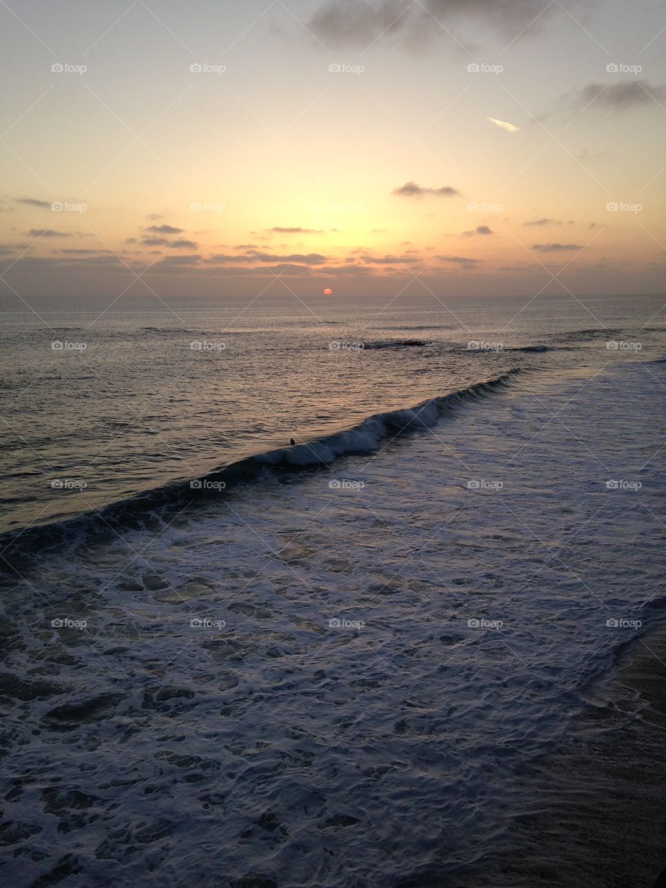 Sunset. I took this from my hotel room at Laguna beach in California. The hotel was right on the water which made for great pics