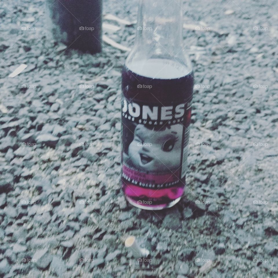 Jones soda on gravel