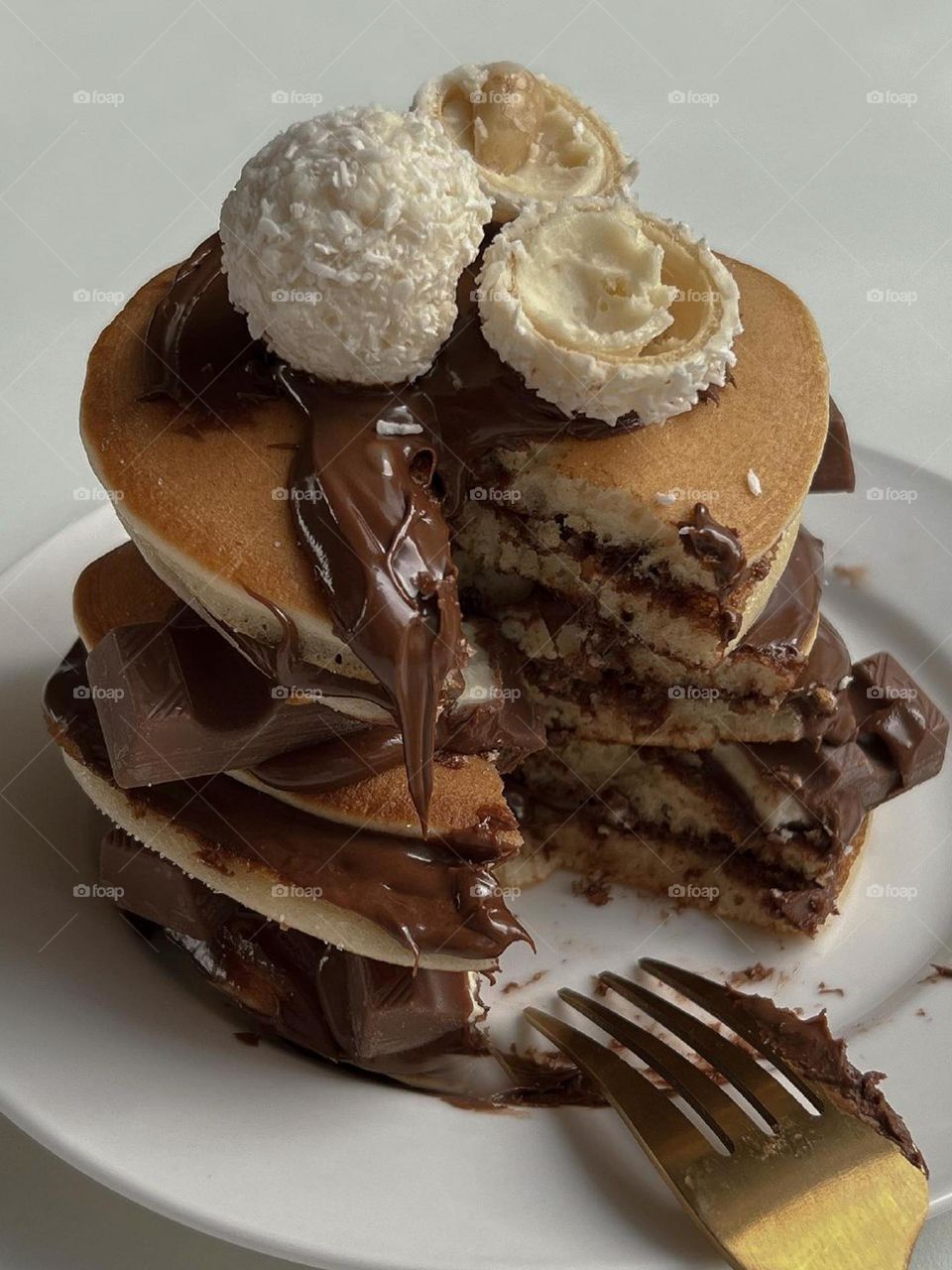 Happiness is in a big bite of chocolate pancake with ice cream, without counting calories