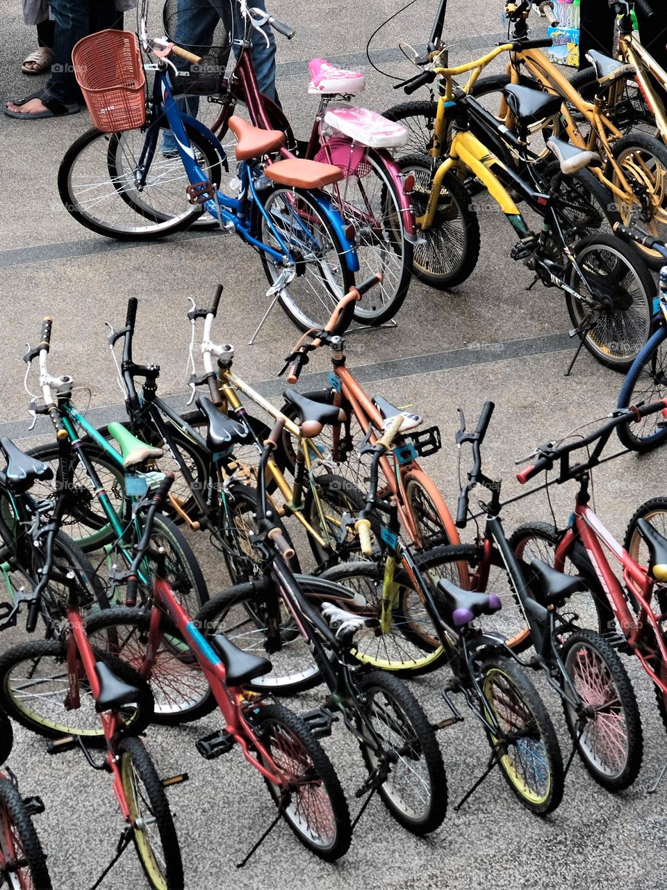 Bicycles for hire parked at the city playground in Kuala Lumpur, Malaysia