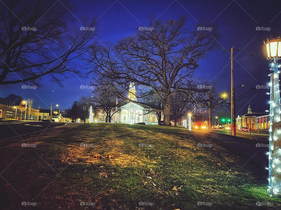 Christmas lights at dusk at the town hall.. 