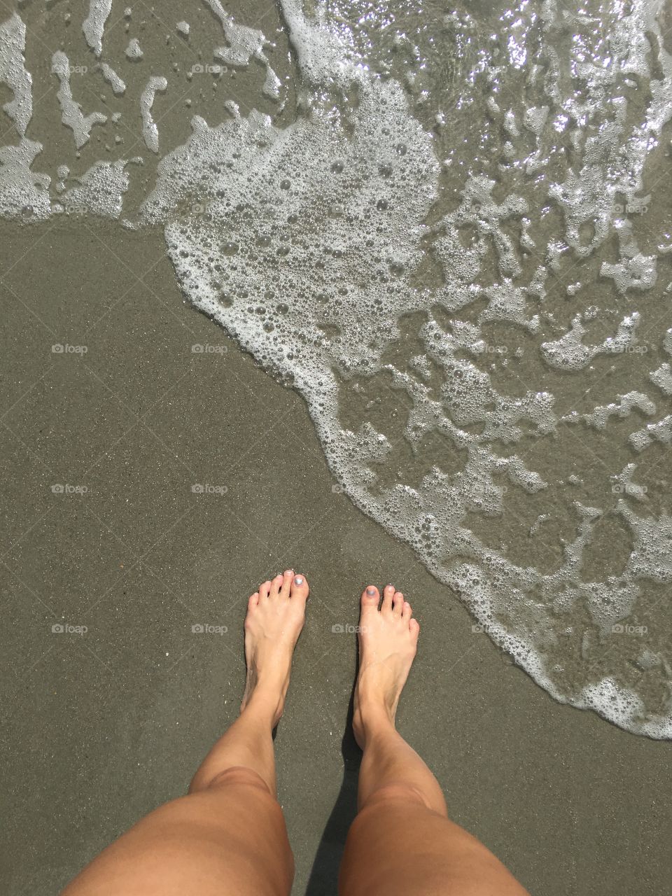 Toes at the water