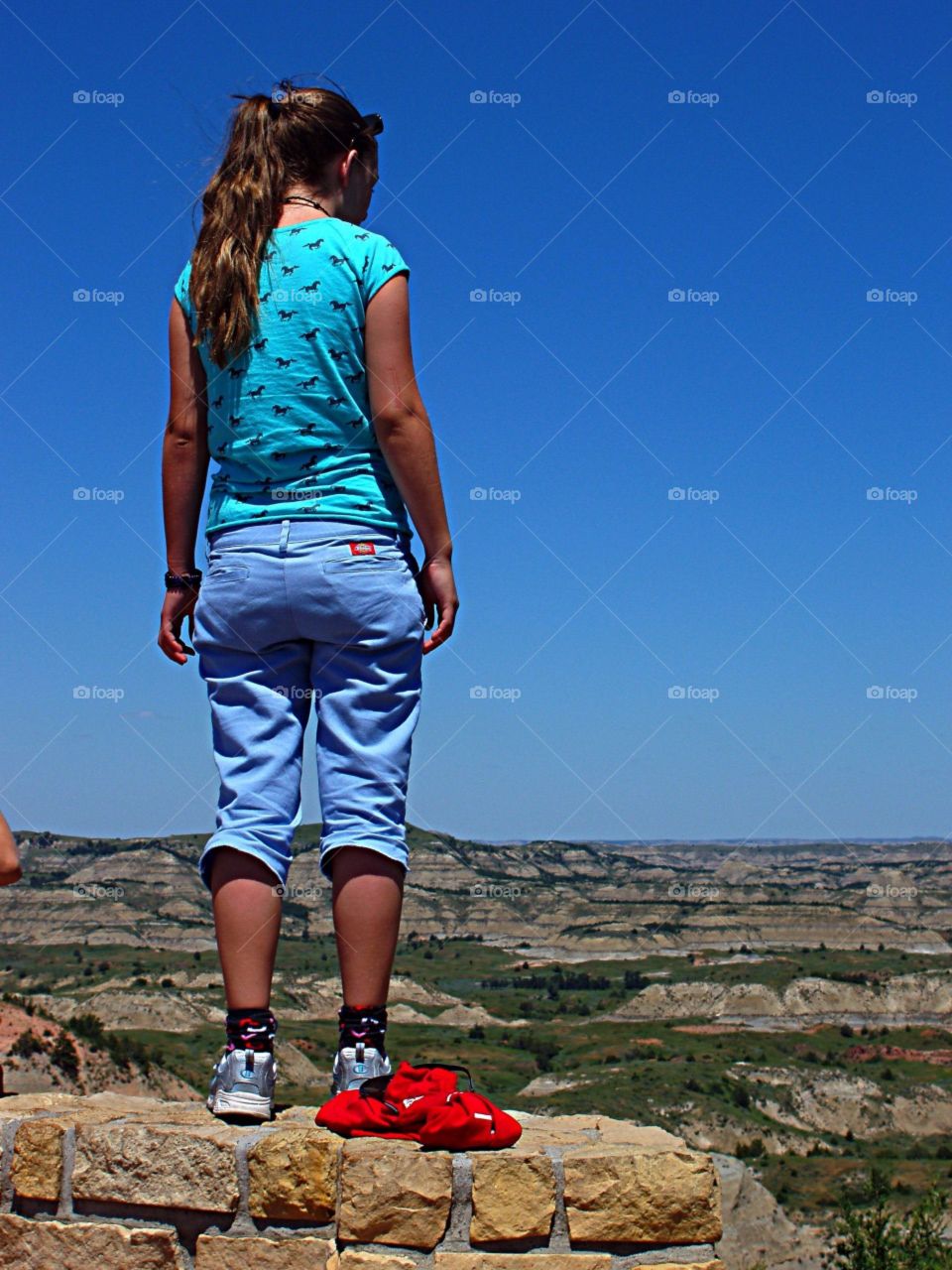 Young Girl Overlooks 